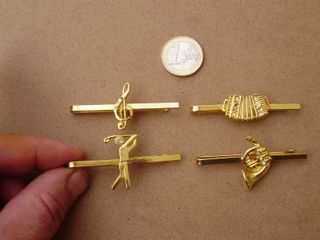 Lote de 4  sujetacorbatas dorados