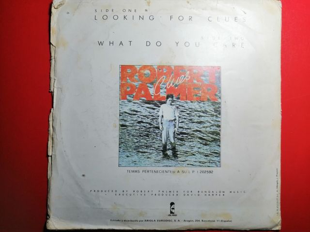 Robert Palmer. Single vinilo. Looking for clues.