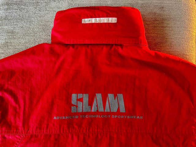 Abrigo impermeable SLAM talla 8 (10-12) Nuevo.