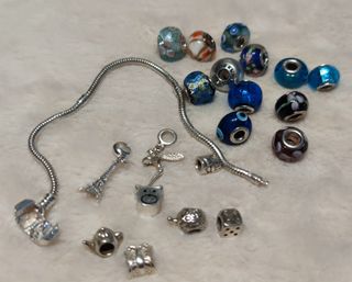 Pulsera plata de abalorios 1ª Ley.