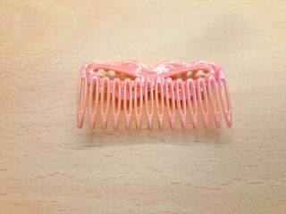 Pettine giocattolo per bambole