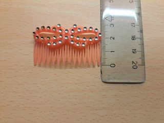 Pettine giocattolo per bambole