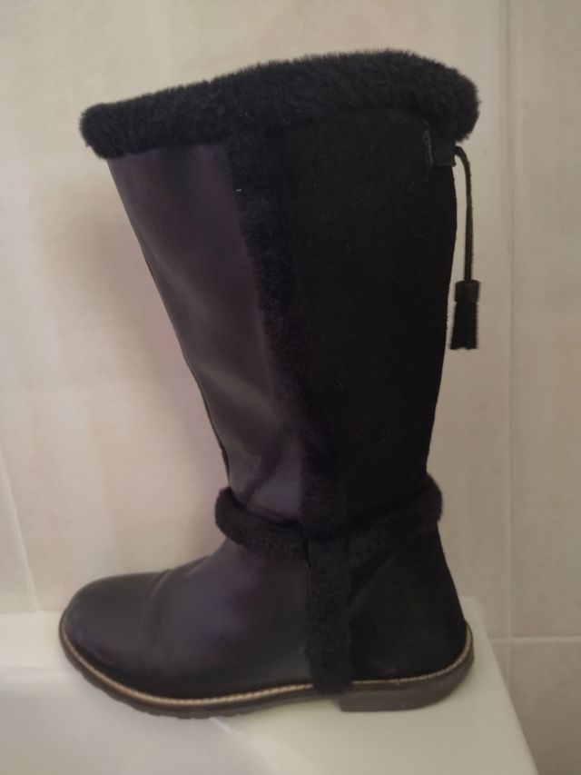 Botas altas de piel para niña