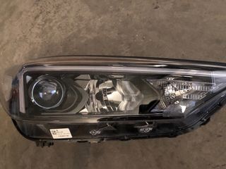 Faro Tucson delantero derecho  