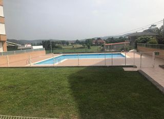 Ático luminoso en urbanización con piscina Noja