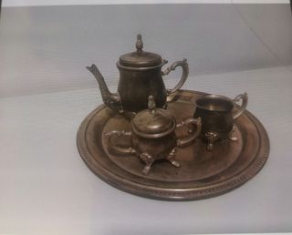 Piezas en alpaca plateada:Juego café, cubiertos,..