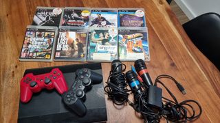 PS3 con juegos y mandos