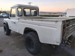 land Rover defender pick up overland camper