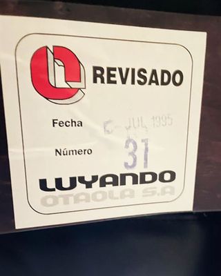 sillon-giratorio-caoba-y-piel-años-70