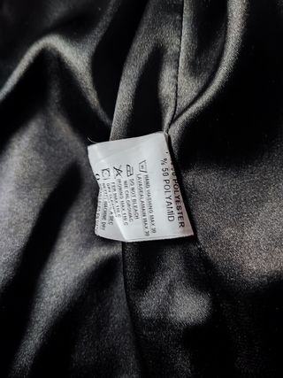 Chaqueta negra de pelo con brillo