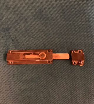 Bloccaporta in ottone