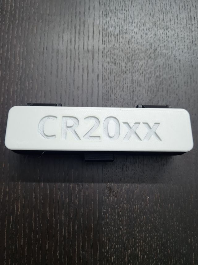 caja guardapilas CR 20