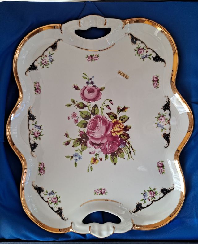 Fuente porcelana y cubertería de acero inoxidable