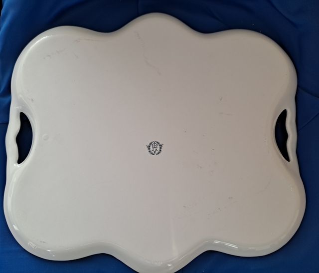 Fuente porcelana y cubertería de acero inoxidable