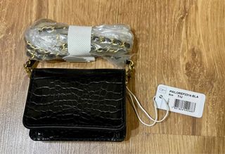 Mini bandolera Guess de cuero nueva