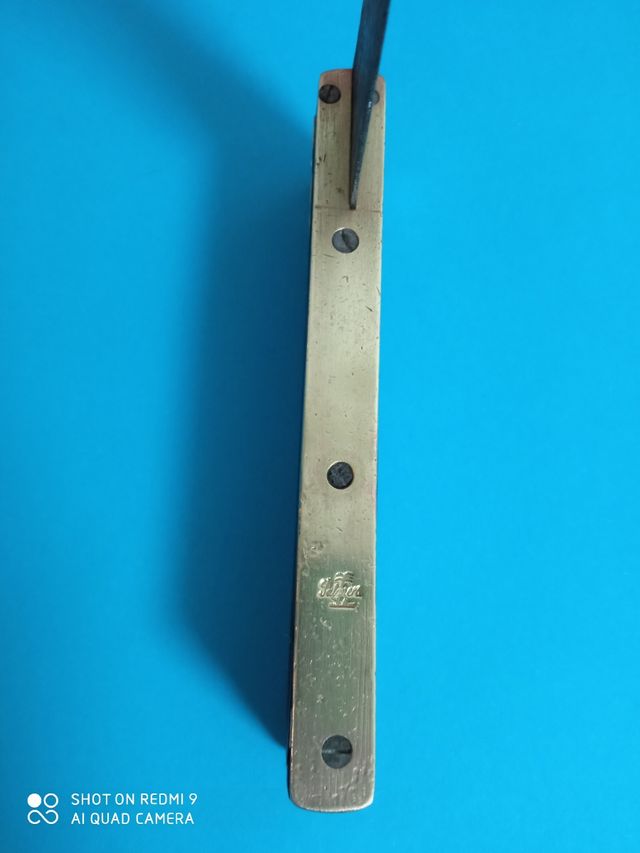 Antiche candeliere in bronzo