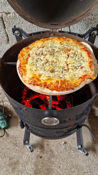 Horno a leña para pizza y barbacoa sin humo.
