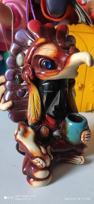 Figura Maya tallada en obsidiana 