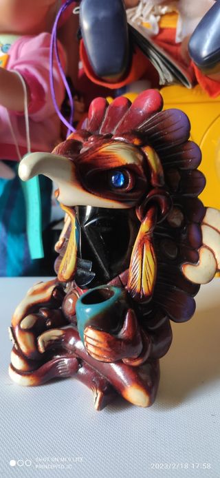 Figura Maya tallada en obsidiana 