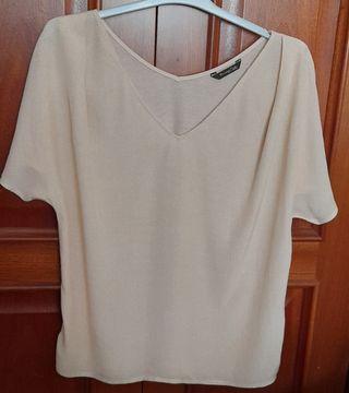 Blusa lunaritos de Massimo Dutti