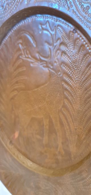 Plato de cobre repujado