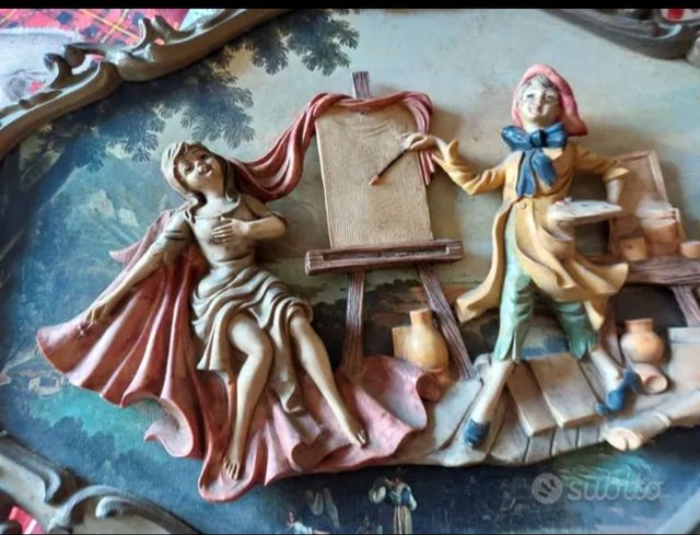 quadro con personaggi  in rilievo