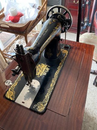 Máquina de coser Singer Antigua