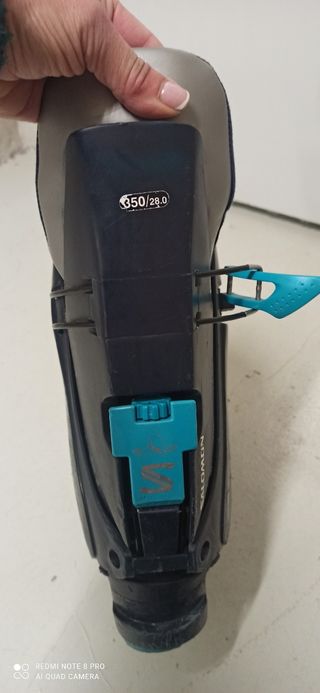 skis y bastones con su funda. Botas n°43,