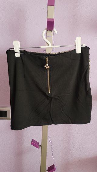 Falda tubo negra lentejuelas doradas