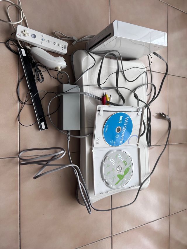 Wii + balace board + wii fit + wii sports