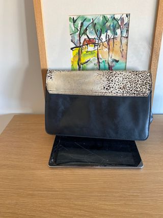 Bolso negro estampado