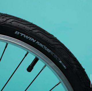 Bicicleta plegable de aluminio oxylane 500 naranja