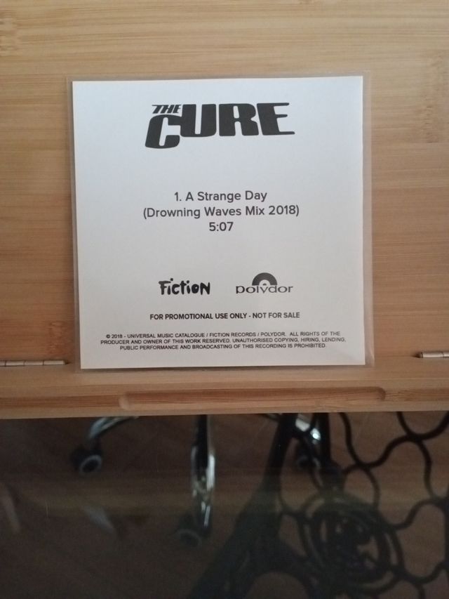 The Cure . A Strange Day (CD promo)