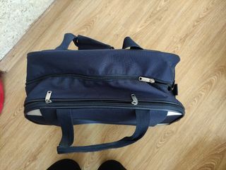 maleta tipo bolsa  con ruedas