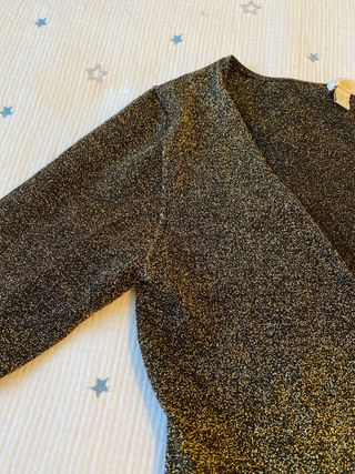 Chaqueta cortita de tono dorado