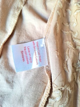 Blusa cruzada bordada