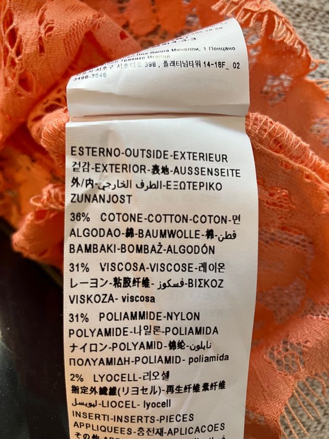 Blusa smanicata traforata Benetton taglia L