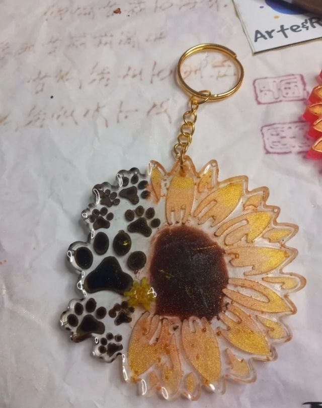 Llavero huella de perro girasol