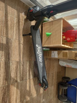 patinete electrico y cargador