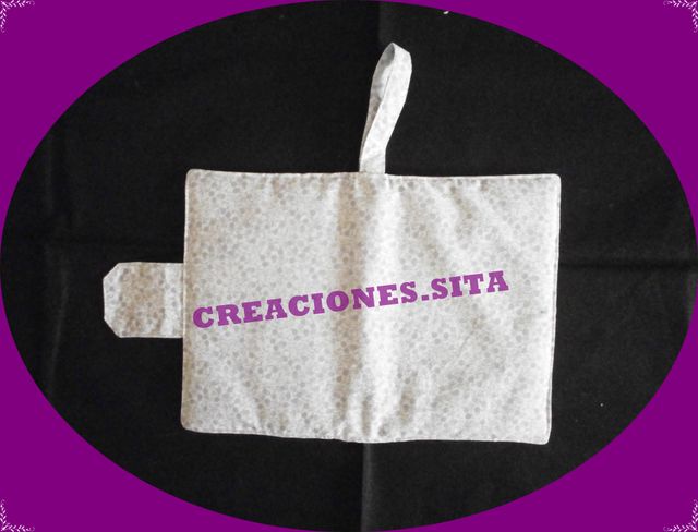 Porta toallitas y pañales.