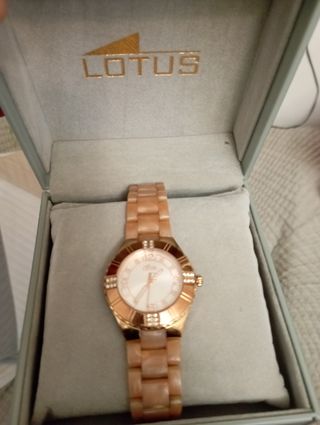 vendo reloj lotus con mecanismo baño oro 