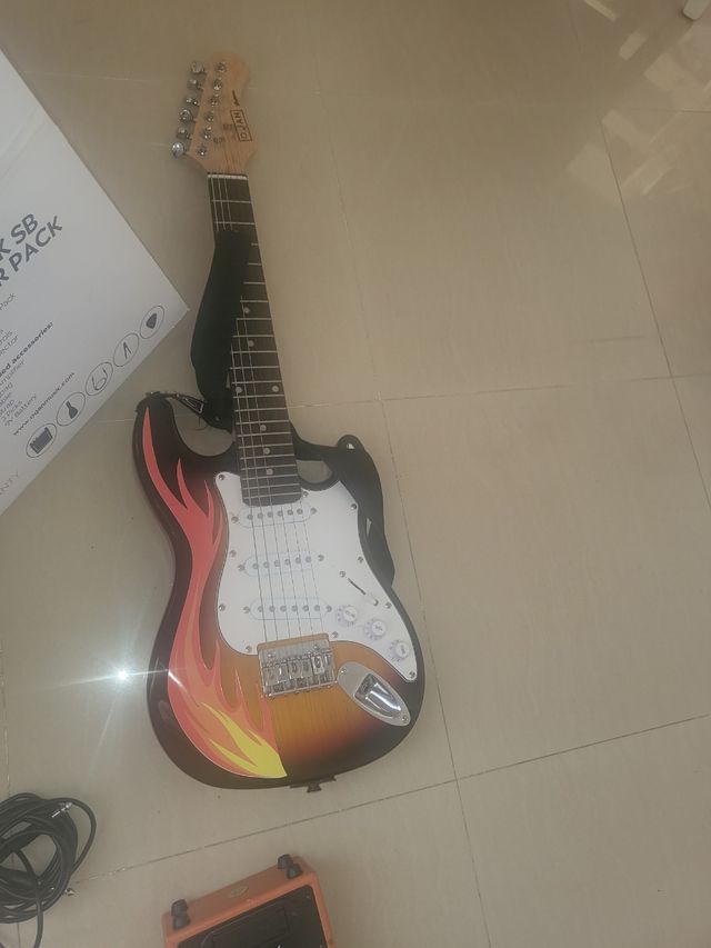 guitarra eléctrica para niño de 10 años más o meno