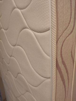 colchón de 80 en perfecto estado con funda.