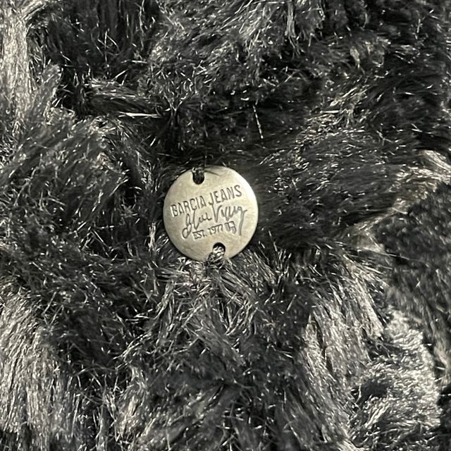 Abrigo de pelo negro reversible T-S (muy nuevo)