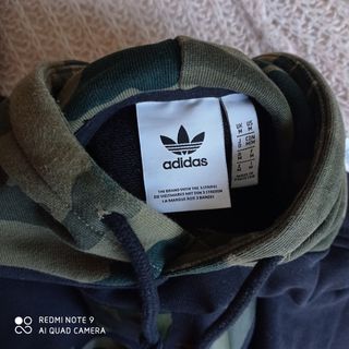 Sudadera azul Adidas con capucha. Talla M