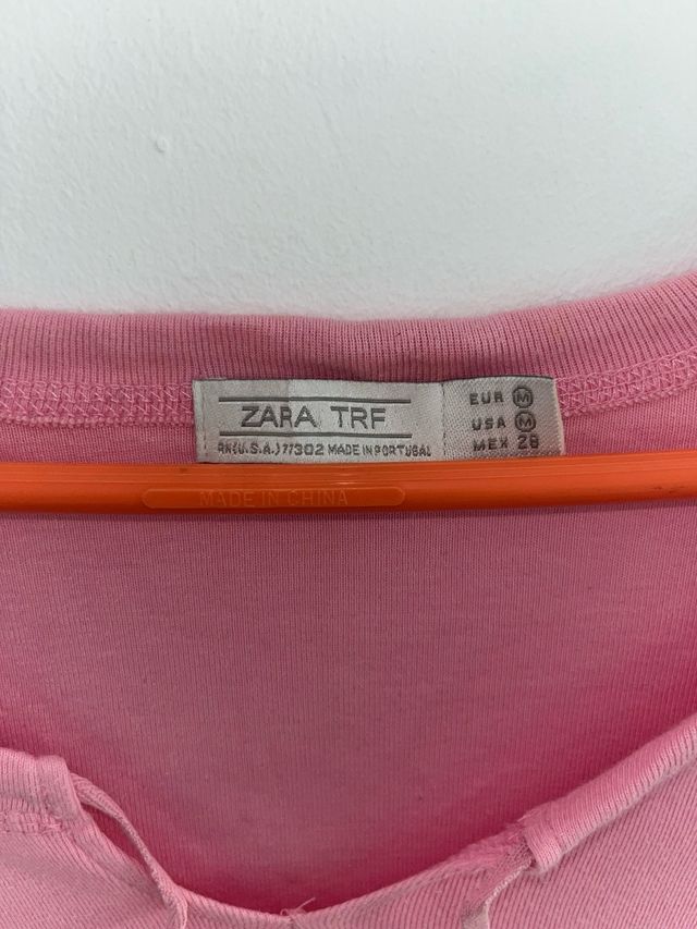 Camiseta rosa manga francesa y cuello barco