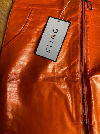 Falda vinilo naranja Kling xs