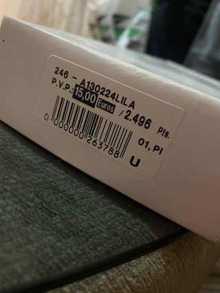 Cartera de mano violeta