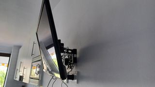 Televisor más soprte pared