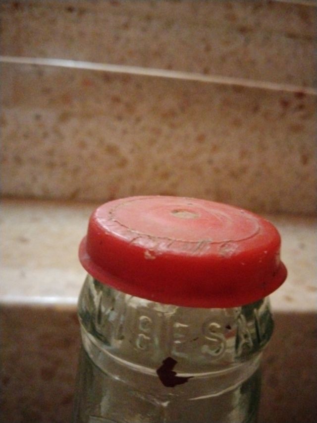 botella de coracion  antigua